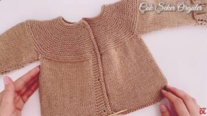 Blusa manga larga de niña a dos agujas