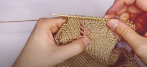 Blusa manga larga de niña a dos agujas