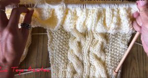 Jersey con trenzas o cables tejido a dos agujas cuello envolvente